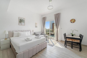 VayK - Modernly Furnished Studio with Pool Views in JVC